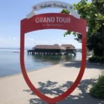 Vue de la Badhütte de Rorschach à travers le cadre rouge du Grand Tour of Switzerland